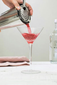 Woman making a cocktail