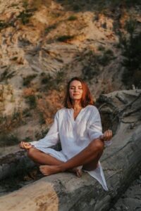 Woman meditating in the open